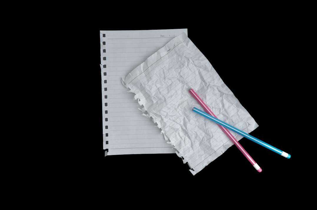 Documents and a pen on a desk