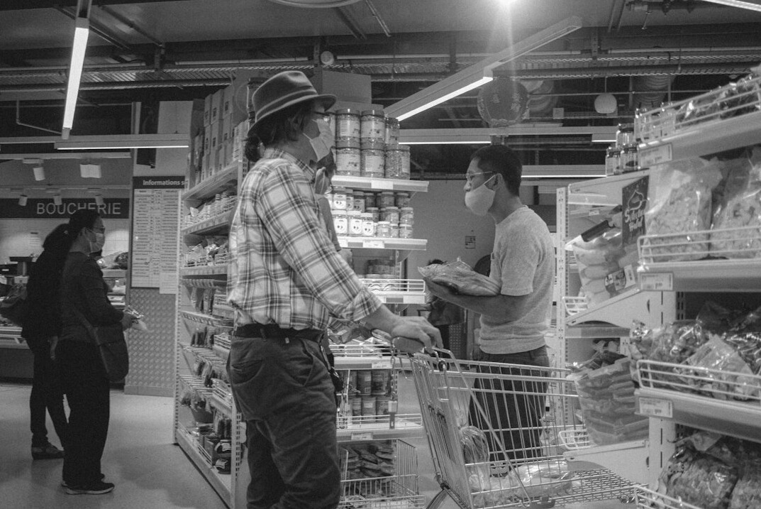 store detective observing shoppers
