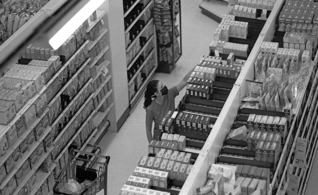 store detective watching customers